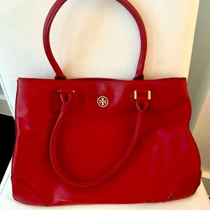 Large Tory Burch Handbag in red leather. Gently used. Can fit a small laptop.